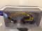8100 Komatsu PW148-10 with clam shell, 1:50 Universal Hobbies